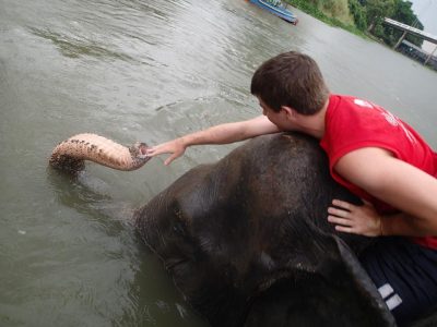 Cook riding Rosukon in the river