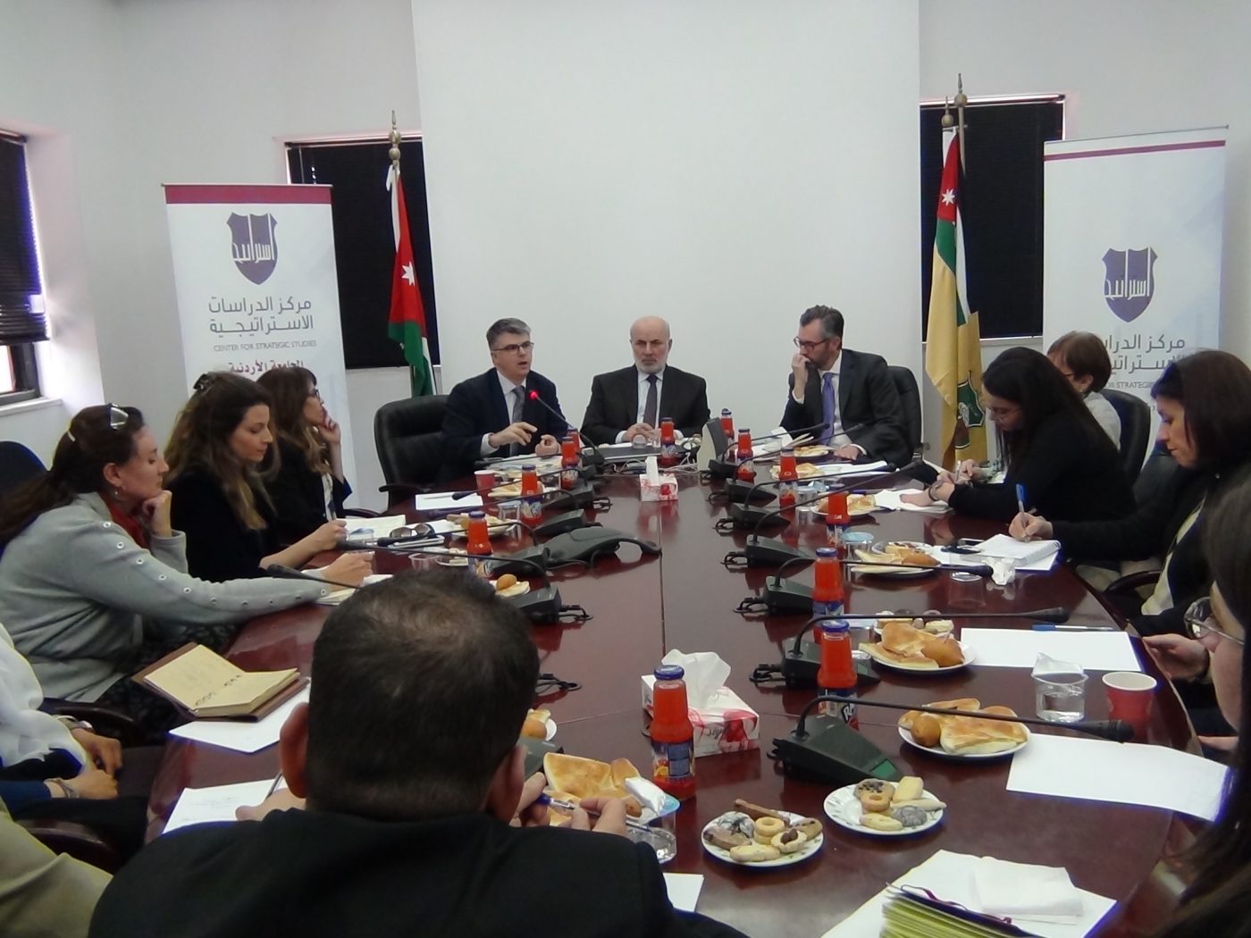James speaking at the Centre for Strategic Studies at the University of Jordan in Amman in 2019.