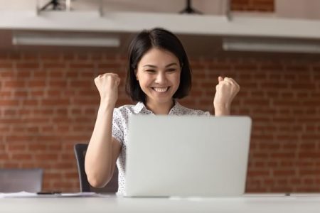 Happy student with laptop